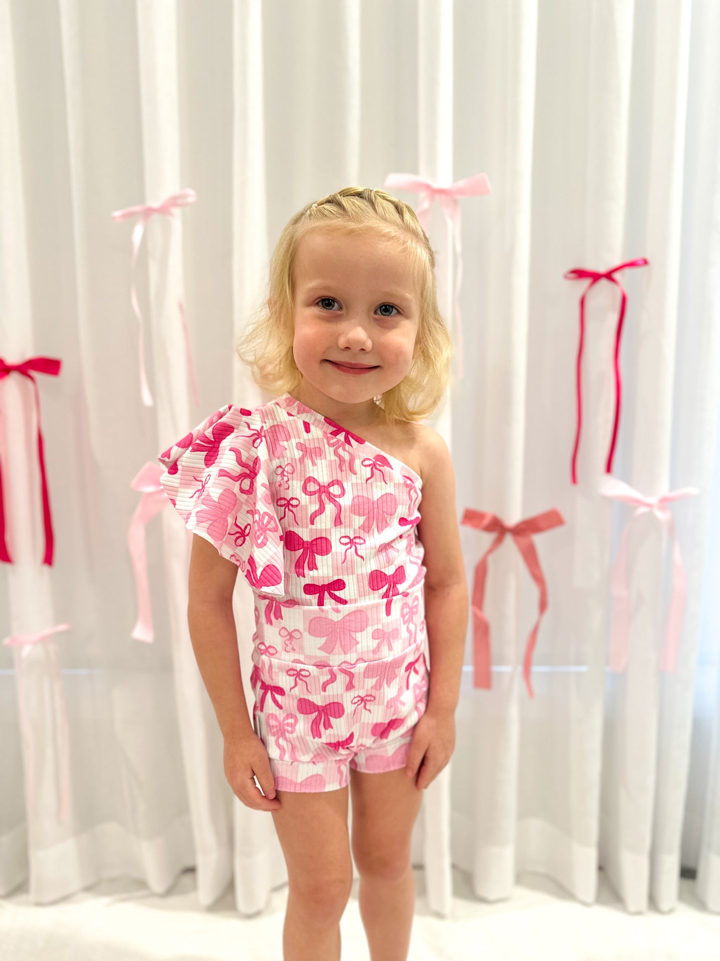 Pink Bow One-Shoulder Bodysuit