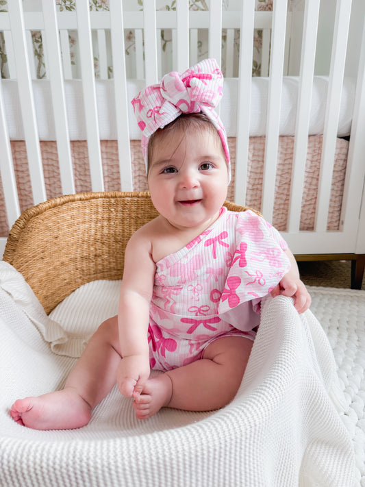 Pink Bow One-Shoulder Bodysuit