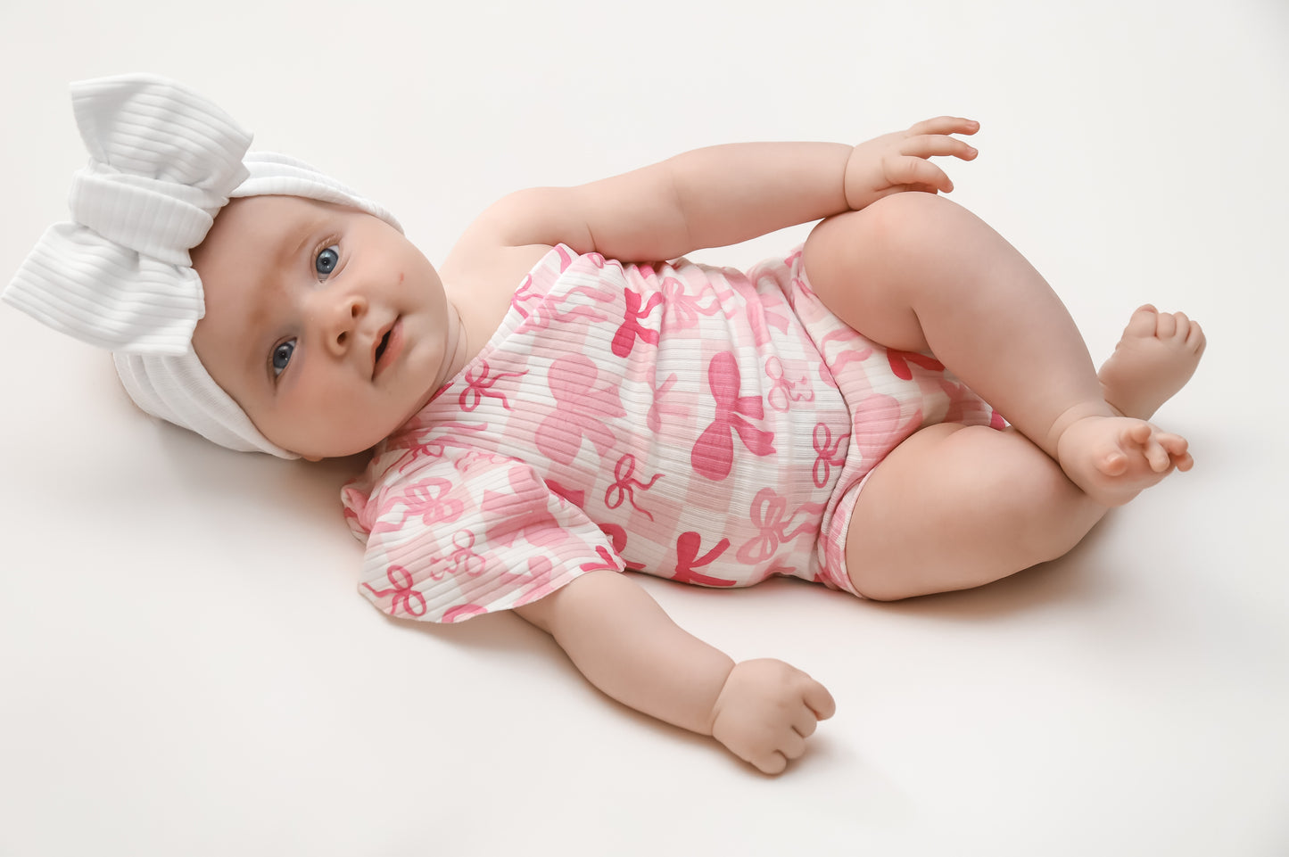 Pink Bow One-Shoulder Bodysuit